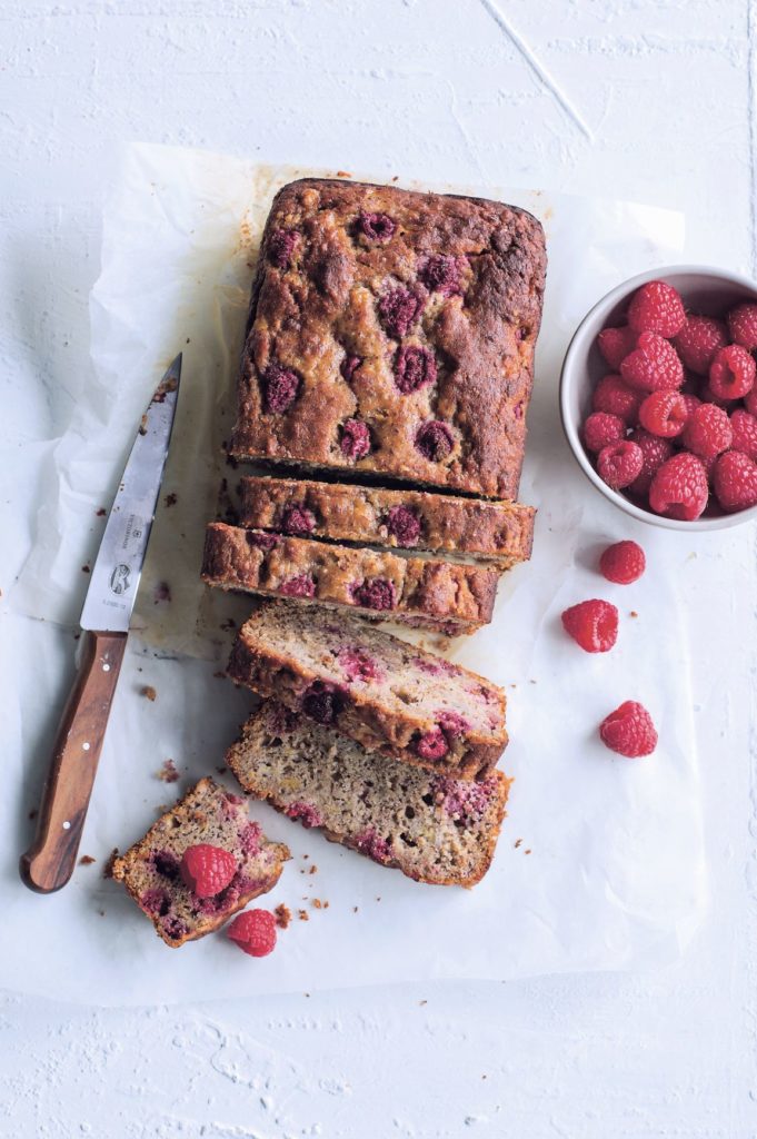 Banana raspberry nut loaf thats been sliced