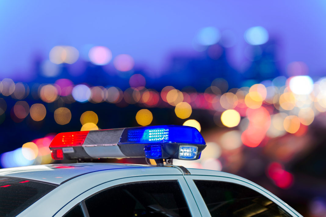 Flashing lights on top of police patrol car