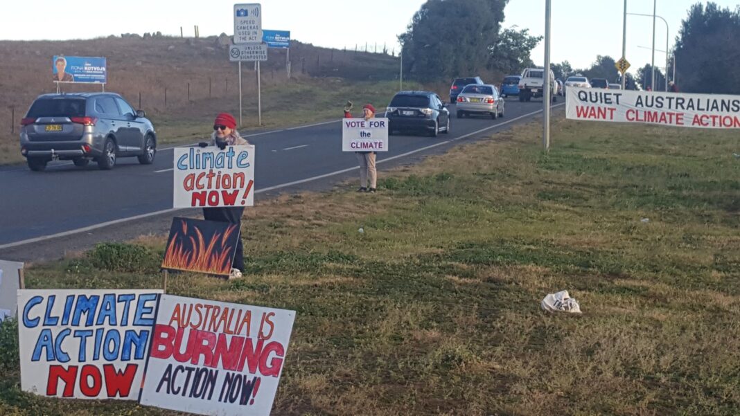 Members of Stop Adani Canberra picket for change in Eden-Monaro by-election.