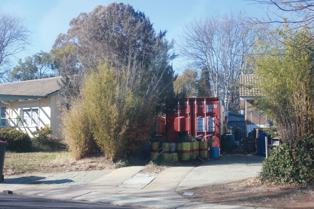 hoarding in front yard of Canberra house