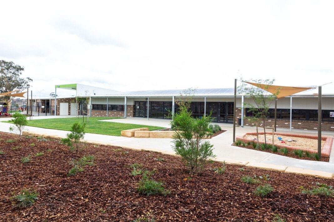 Contemporary new primary school with garden and shaded playground