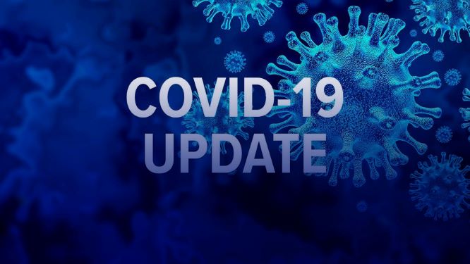 Covid-19 update graphic with blue virus against dark blue background