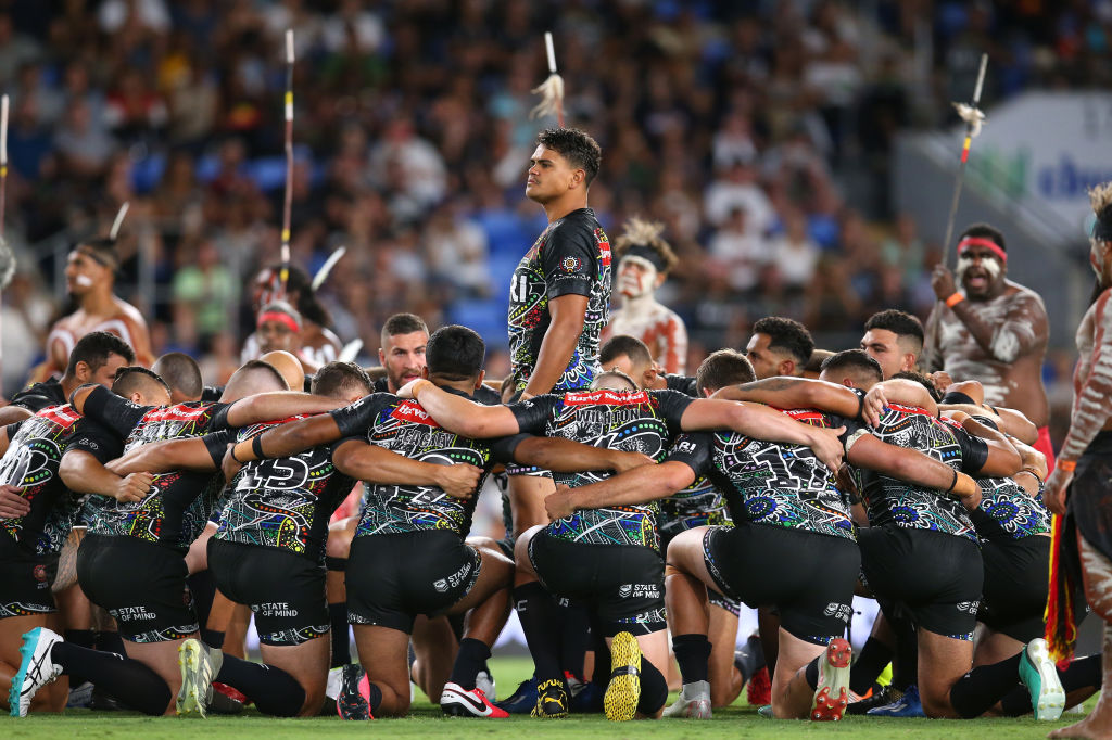 Latrell Mitchell of the Indigenous All-Stars performs an Indigenous dance during the NRL match between the Indigenous All-Stars and the New Zealand Maori Kiwis All-Stars