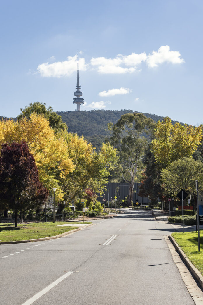 view of Telstra Tower from a street below