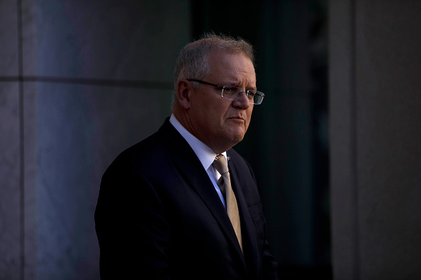 Australian Prime Minister Scott Morrison with serious expression on his face at a press conference