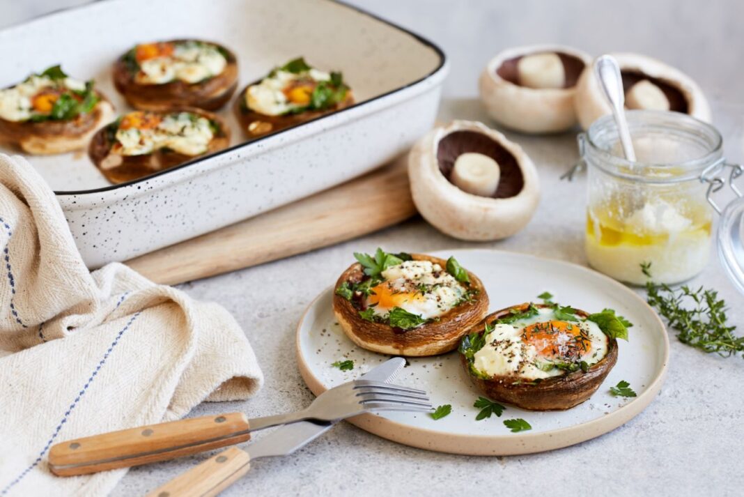 Baked breakfast mushrooms stuffed with spinach, feta and egg