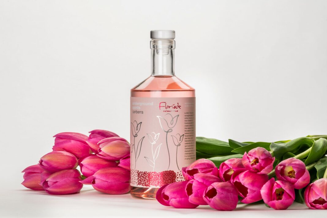 Underground Spirits' Floriade gin bottle among pink tulips
