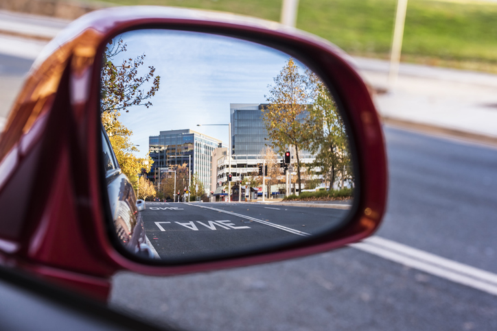 View of Canberra CBD from rearview mirror