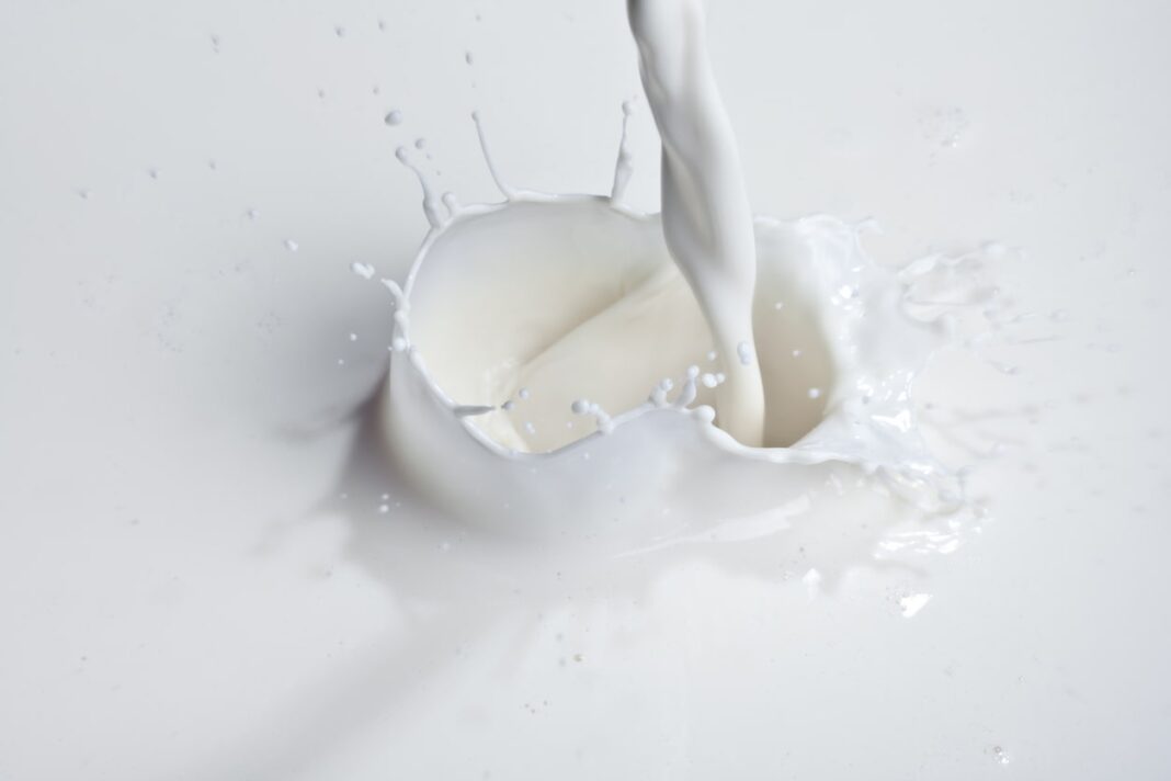 Splash of white milk.