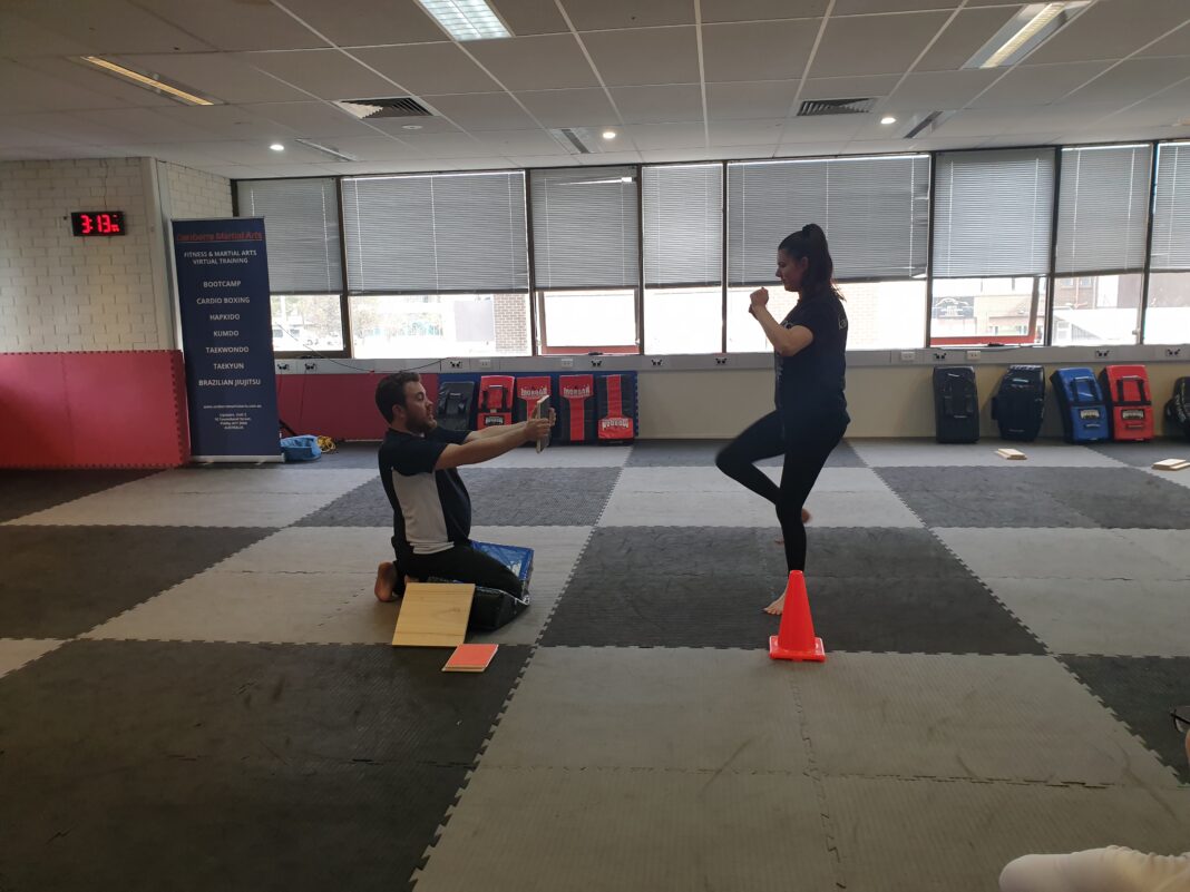 two women practicing self defence