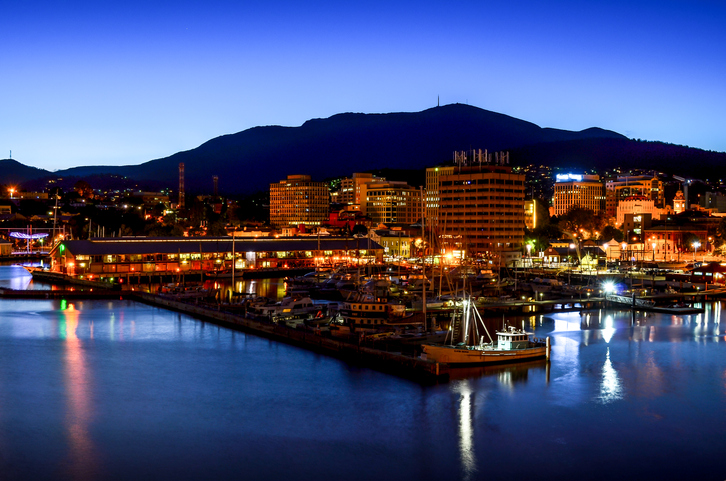 City of Hobart lit up a night with lights reflecting on the Derwent River