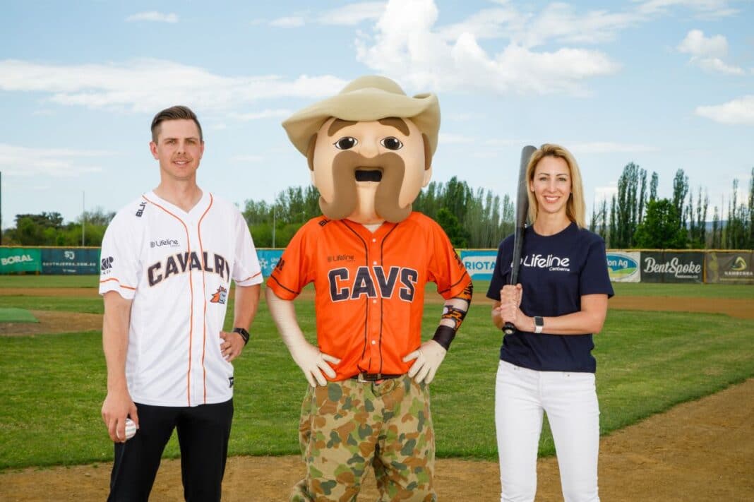 canberra cavalry mascot with two people