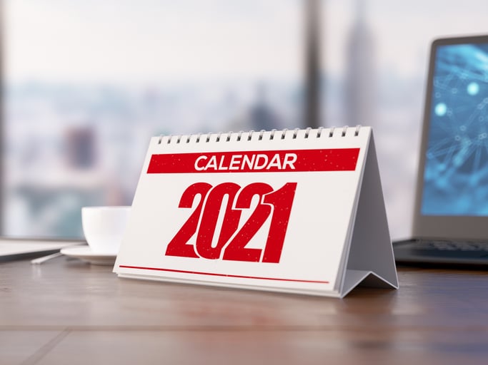 red and white 2021 Calendar at Office Desk