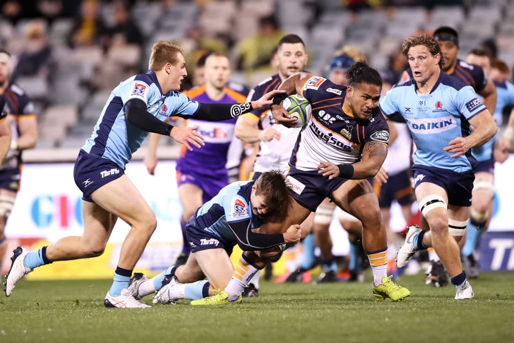 Brumbies player running with the ball