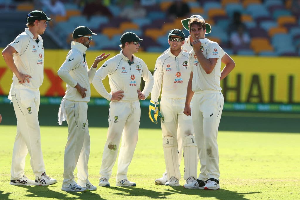BRISBANE, AUSTRALIA - JANUARY 19: Australia players watch a review during day five of the 4th Test Match in the series between Australia and India at The Gabba on January 19, 2021 in Brisbane, Australia. (Photo by Chris Hyde - CA/Cricket Australia via Getty Images)