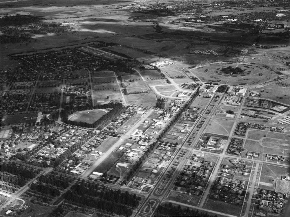Turner, Braddon, Canberra City and Reid, aerial view from Haig Park looking southwest to Parkes and Barton. Northbourne Avenue runs from bottom centre to City Hill at upper right. March 1953. Picture provided by ACT Heritage Library.