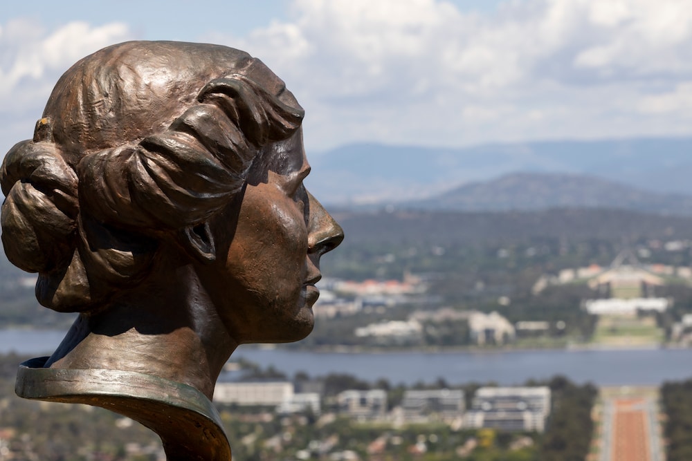 A statue of Marion Mahony Griffin is positioned facing out from the Ainslie lookout.