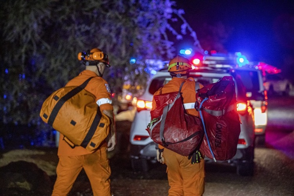 ACT emergency crews on the scene of a swift water rescue at Kambah pool overnight