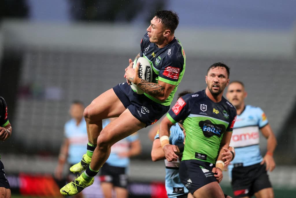 SYDNEY, AUSTRALIA - MARCH 21: Charnze Nicoll-Klokstad of the Raiders catches a high ball during the round two NRL match between the Cronulla Sharks and Canberra Raiders at Netstrata Jubilee Stadium on March 21, 2021 in Sydney, Australia. (Photo by Speed Media/Icon Sportswire via Getty Images)