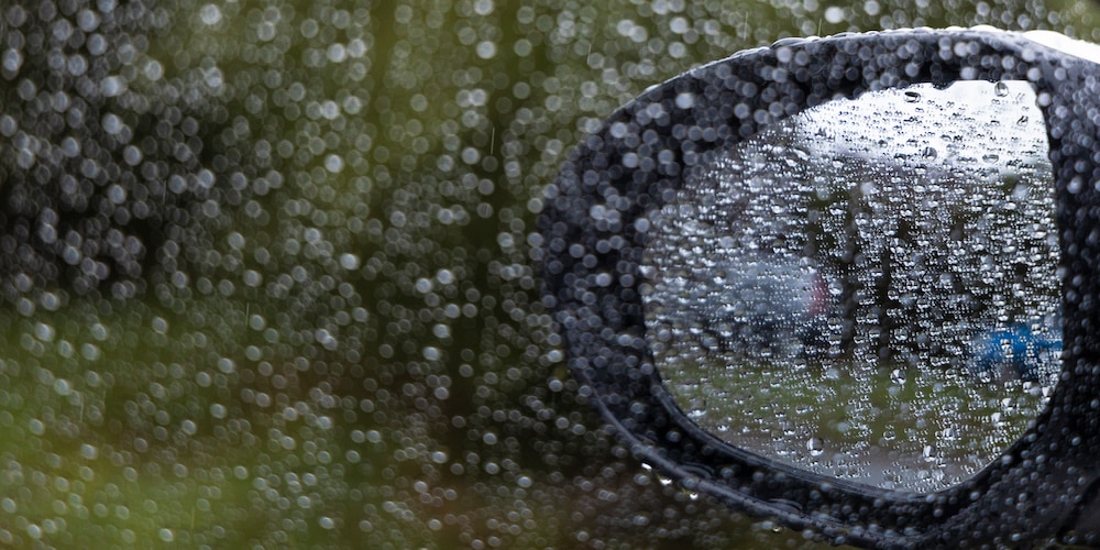 rain on car window and mirror