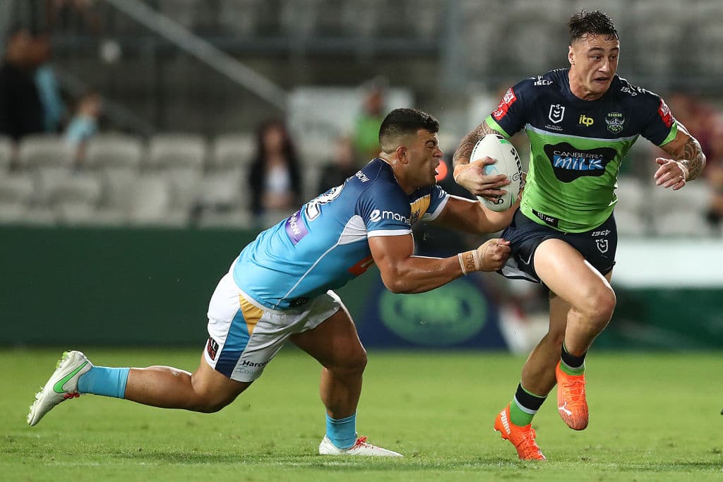 SYDNEY, AUSTRALIA - APRIL 03: Charnze Nicoll-Klokstad of the Raiders is tackled by David Fifita of the Titans during the round four NRL match between the Gold Coast Titans and the Canberra Raiders at Netstrata Jubilee Stadium, on April 03, 2021, in Sydney, Australia. (Photo by Mark Metcalfe/Getty Images)