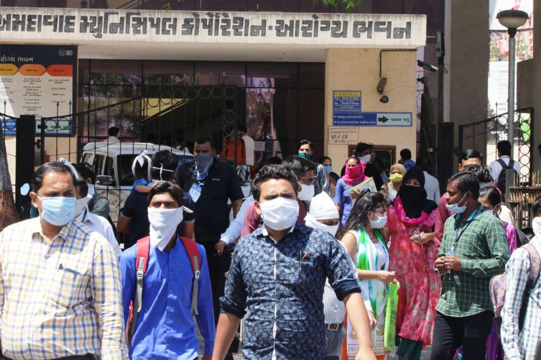 people in India wearing face masks