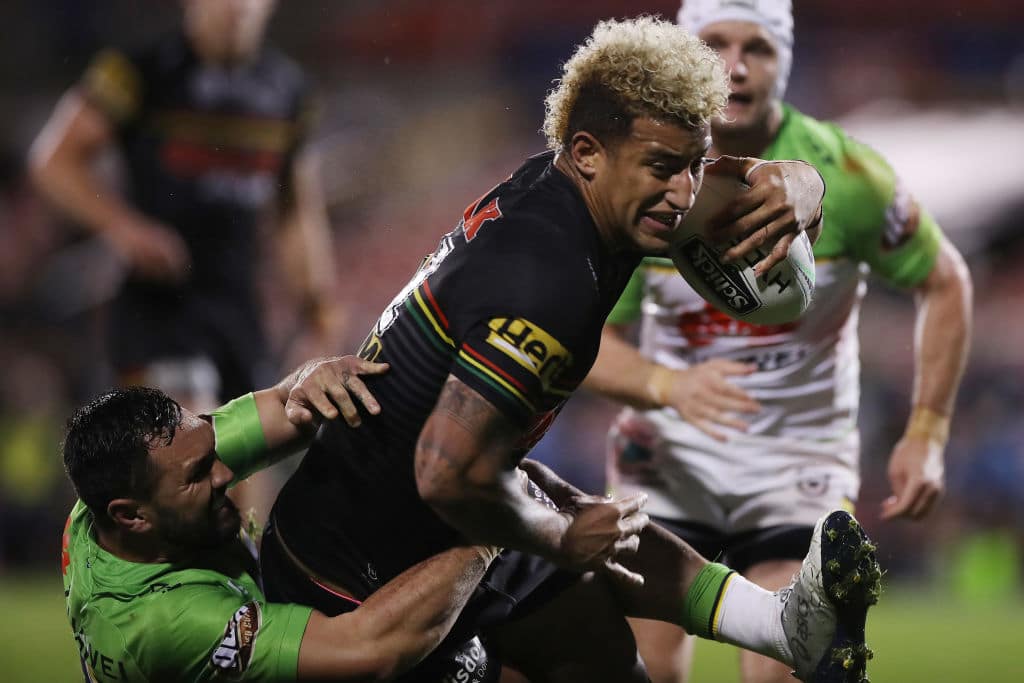 SYDNEY, AUSTRALIA - AUGUST 08: Viliame Kikau of the Panthers is tackled during the round 13 NRL match between the Penrith Panthers and the Canberra Raiders at Panthers Stadium on August 08, 2020 in Sydney, Australia. (Photo by Mark Kolbe/Getty Images)