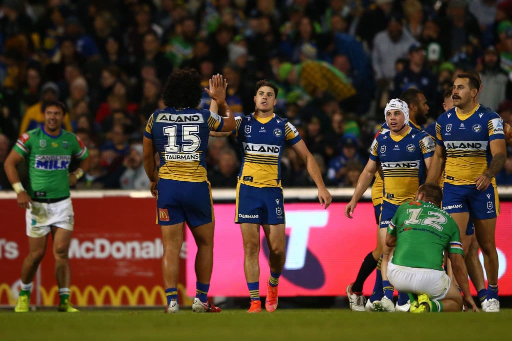 CANBERRA, AUSTRALIA - APRIL 17: Mitchell Moses of the Eels celebrates with Isaiah Papali'i of the Eels after an Eels try during the round six NRL match between the Canberra Raiders and the Parramatta Eels at GIO Stadium on April 17, 2021, in Canberra, Australia. (Photo by Matt Blyth/Getty Images)