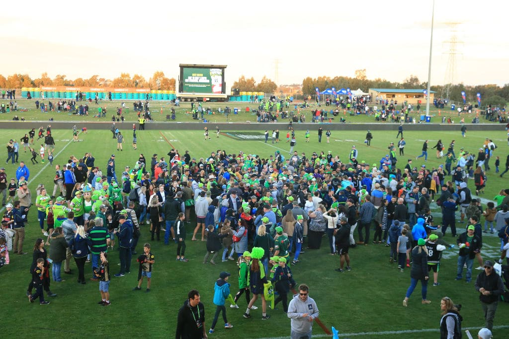 WAGGA WAGGA, AUSTRALIA - MAY 04: The crowd mob the Canberra players after the round eight NRL match between the Canberra Raiders and the Penrith Panthers at McDonalds Park on May 04, 2019 in Wagga Wagga, Australia. (Photo by Mark Evans/Getty Images)
