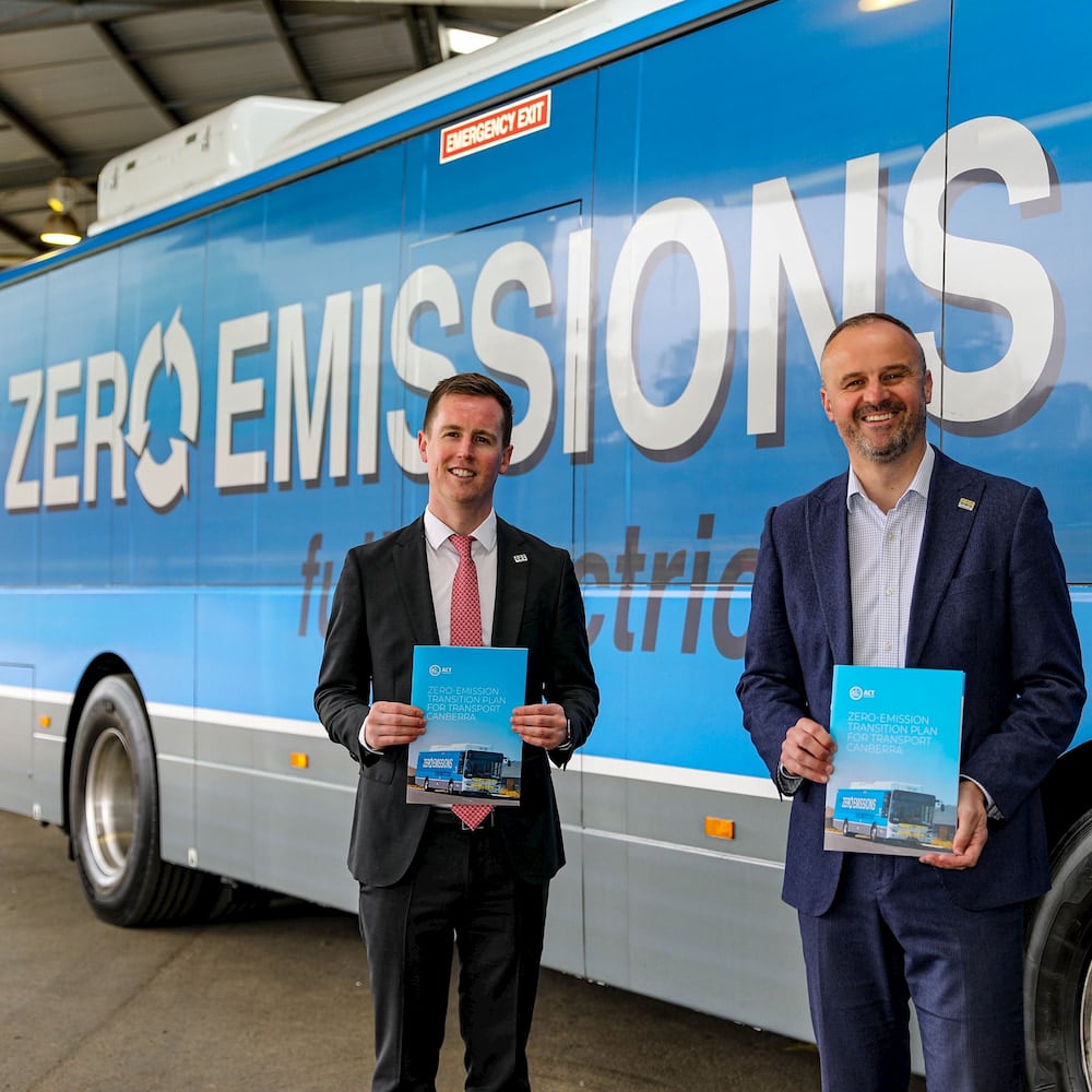 Chris Steel, Minister for Transport and City Services, and Chief Minister Andrew Barr open the market sounding for electric buses last year. Photo: Facebook.
