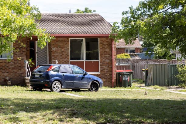 suburban house in Narrabundah ACT with bullet holes in the front window