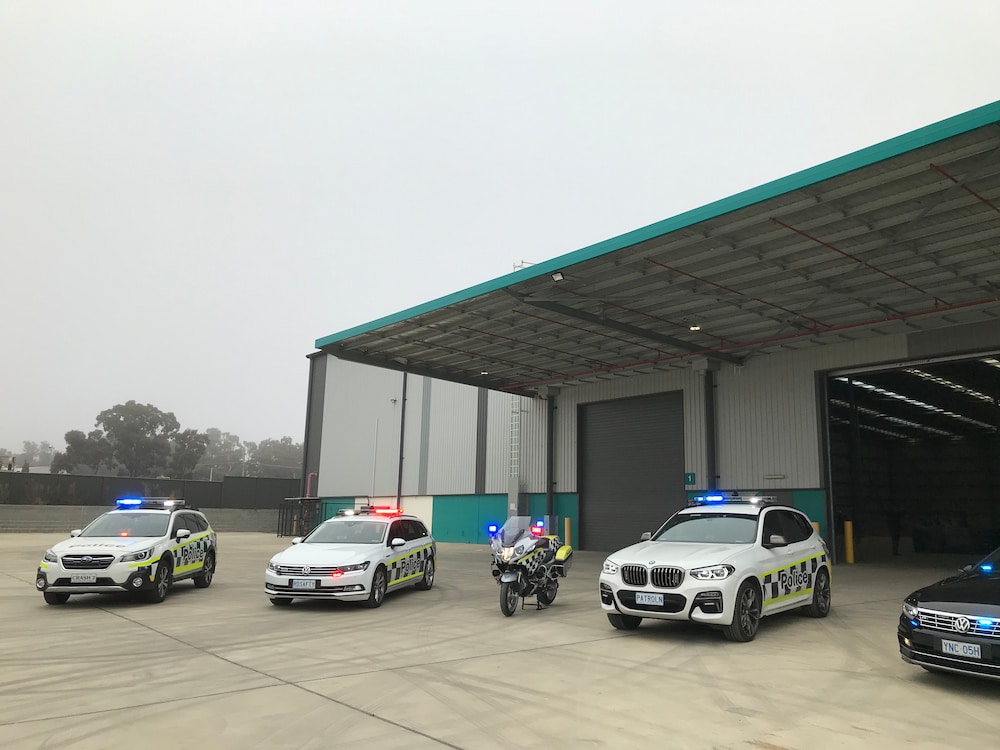 Police vehicles at the Hume site. Photo: Nick Fuller
