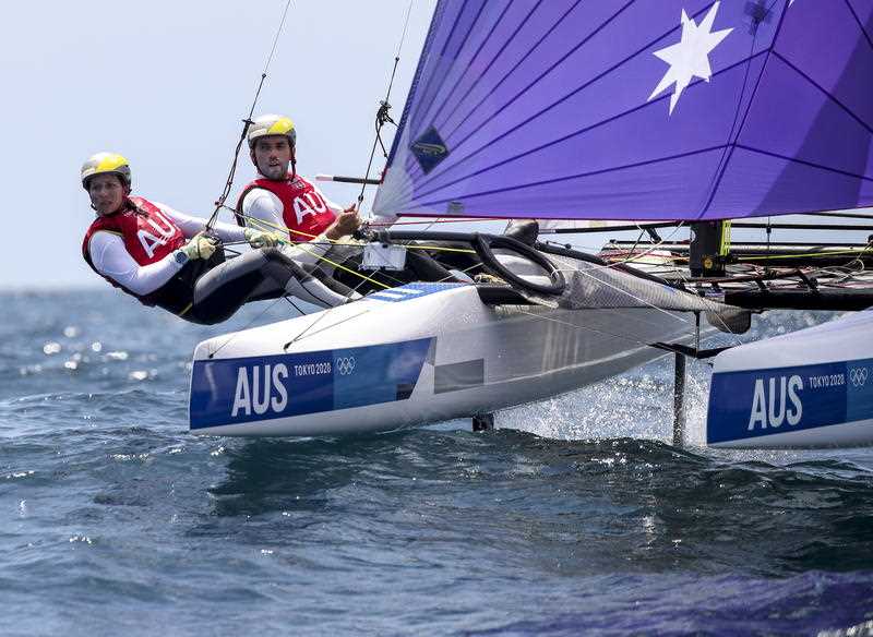 Cousins Jason Waterhouse and Lisa Darmanin of Australia compete in the mixed Nacra 17 Foiling class race during the Sailing events of the Tokyo 2020 Olympic Games