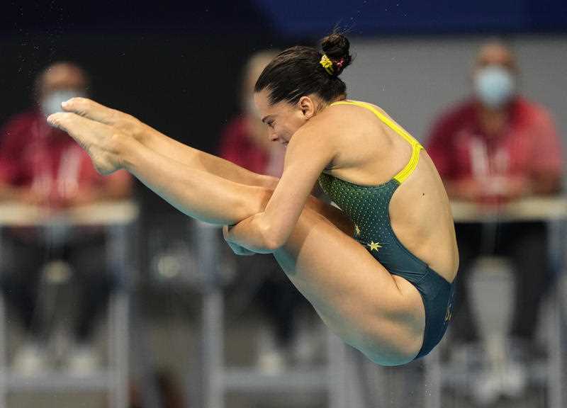 Esther Qin of Australia competes in women's diving 3m springboard semifinal at the Tokyo Aquatics Centre