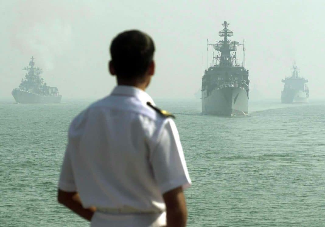 An Indian naval officer supervises the joint exercise between Indian and foreign warships as part of the concluding ceremony of the International Fleet Review at the high seas off Bombay in 2001.