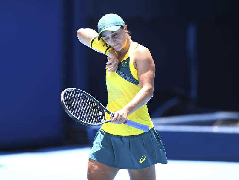 Australian female tennis star Ash Barty reacts during a match