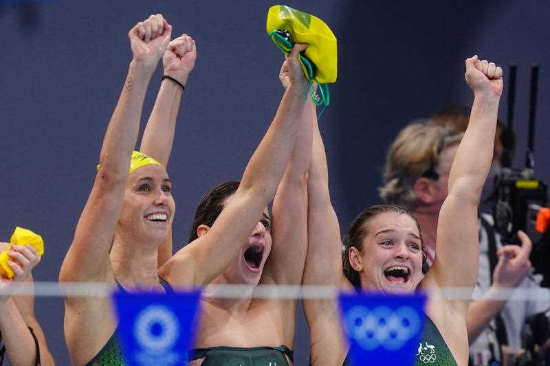 Australia’s 4x100m Medley Relay team of Kaylee McKeown, Chelsea Hodges, Emma McKeon and Cate Campbell celebrate their Gold medal win at the Tokyo Aquatics Centre
