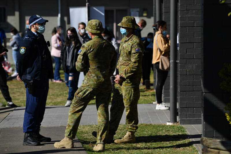 Australian Defence Force troops at a walk-in AstraZeneca vaccination clinic at Wattle Grove in Sydney, Tuesday, August 3, 2021
