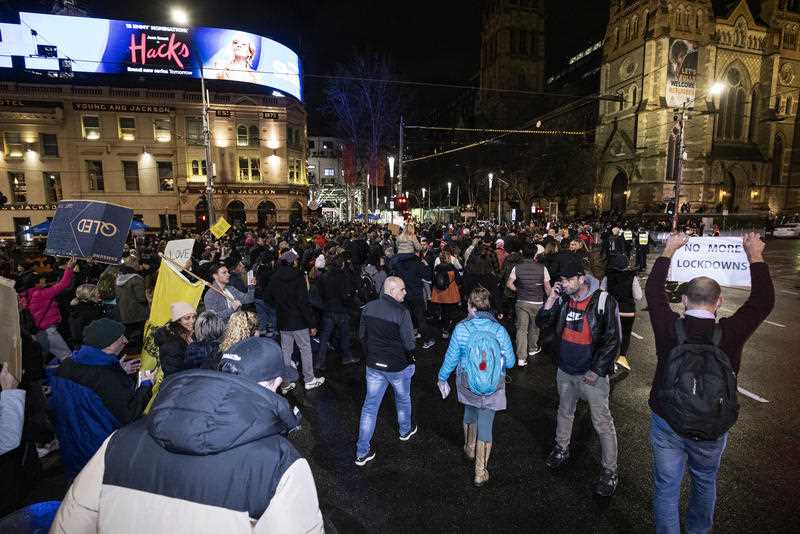 Hundreds of Protesters are seen at an anti-lockdown rally in Melbourne, Thursday, August 5, 2021