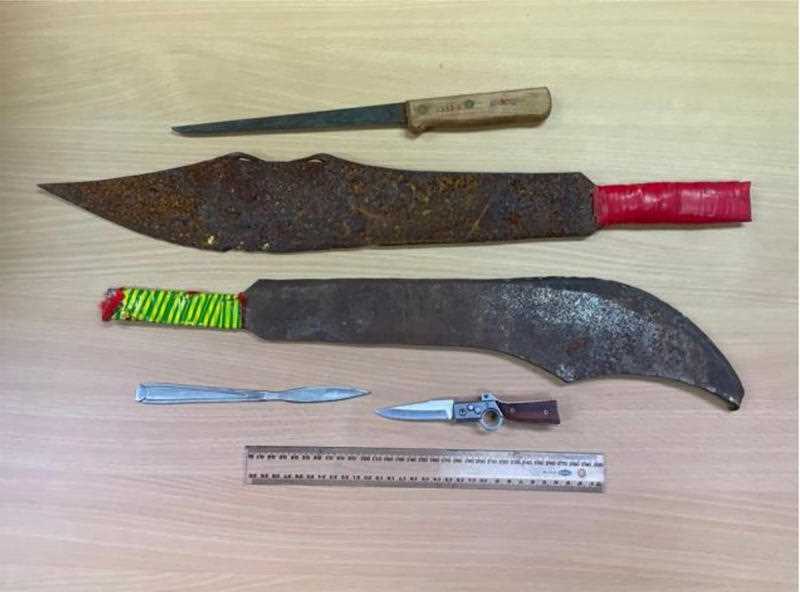 A supplied image of machetes and knives relating to teachers in a remote Northern Territory community who have repeatedly had their homes broken into by children wielding machetes