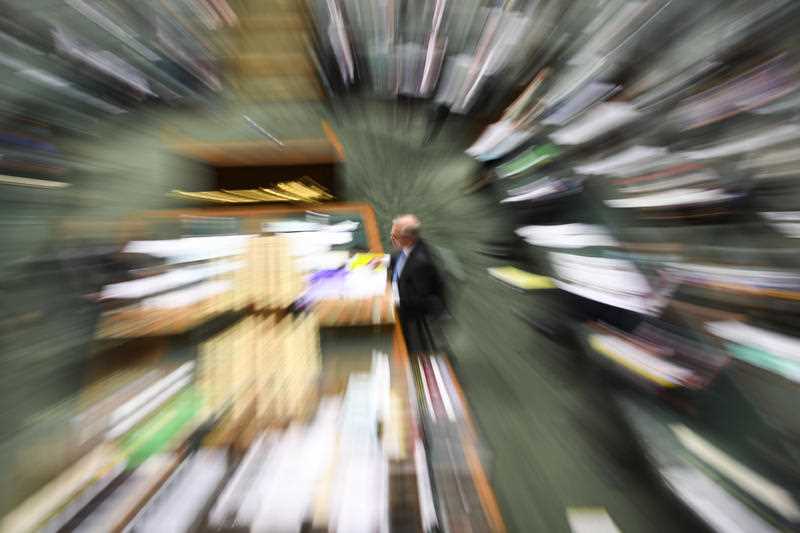 A zoom-out image shows Australian Prime Minister Scott Morrison during House of Representatives Question Time at Parliament House in Canberra, Thursday, August 12, 2021