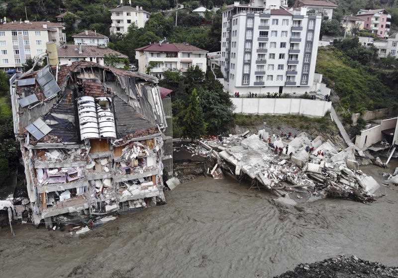 An aerial photo shows the destruction after floods and mudslides killed about three dozen people, in Bozkurt town of Kastamonu province, Turkey, Friday, Aug. 13, 2021.