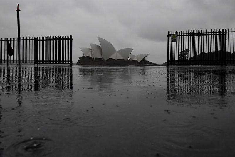 The Sydney Opera House during rainfall in Sydney, Tuesday, August 24, 2021