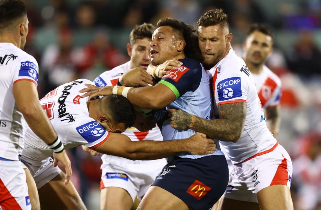 WOLLONGONG, AUSTRALIA - JUNE 19: Josh Papalii of the Raiders is tackled during the round 15 NRL match between the St George Illawarra Dragons and the Canberra Raiders at WIN Stadium, on June 19, 2021, in Wollongong, Australia. (Photo by Mark Nolan/Getty Images)