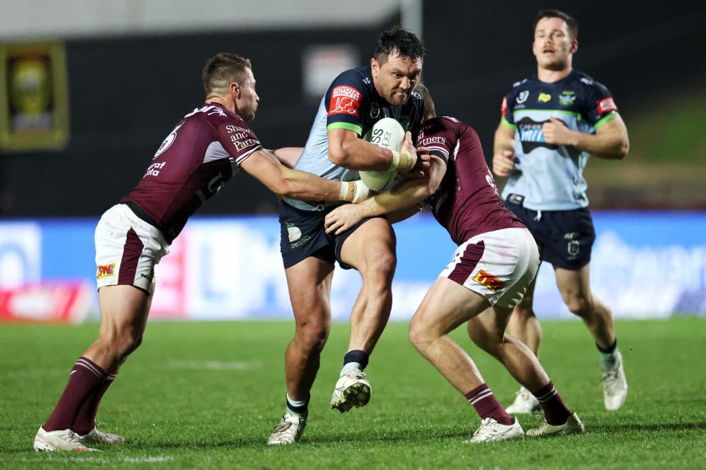 SYDNEY, AUSTRALIA - JULY 08: Jordan Rapana of the Raiders is tackled during the round 17 NRL match between the Manly Sea Eagles and the Canberra Raiders at 4 Pines Park on July 08, 2021, in Sydney, Australia. (Photo by Cameron Spencer/Getty Images)