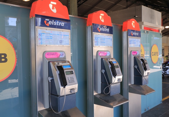 3 Telstra public phone at Flinders Street Station in Melbourne