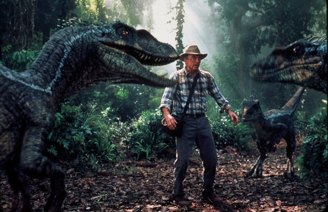 Actor Sam Neill, as Dr. Alan Grant, encounters a group of raptors in Universal Pictures' 