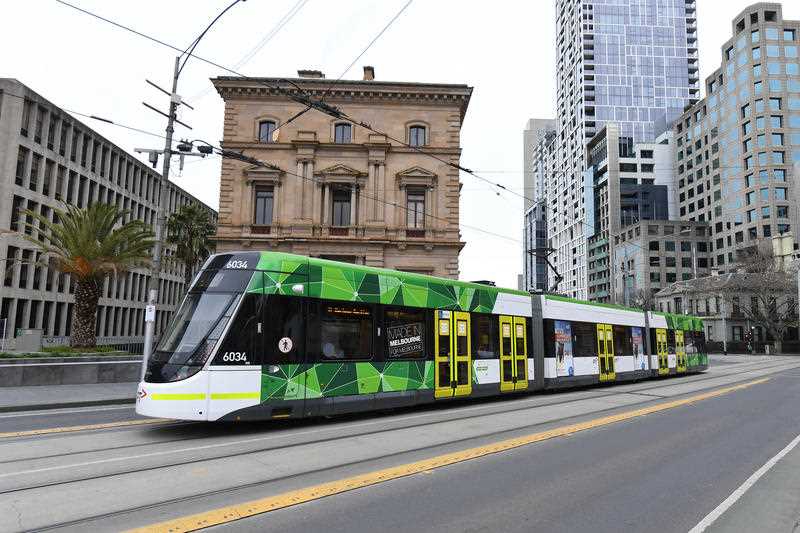 A public transport tram is seen within the central business district of Melbourne, Friday, August 7, 2020