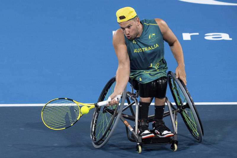 Dylan Alcott of Australia plays against Sam Schroder of the Netherlands in the Quad Singles Wheelchair Tennis Gold Medal Match at the Tokyo 2020 Paralympic Games in Tokyo Saturday, Sept. 4, 2021