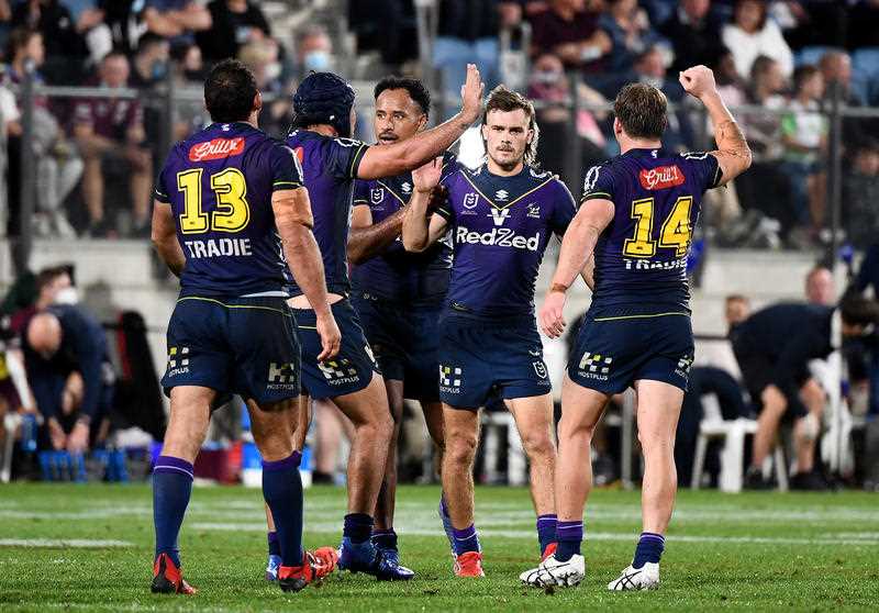 Ryan Papenhuyzen of the Storm (centre) reacts with players following the NRL Qualifying Final match between the Melbourne Storm and the Manly Sea Eagles, at Sunshine Coast Stadium, on the Sunshine Coast, Friday, September 9, 2021.